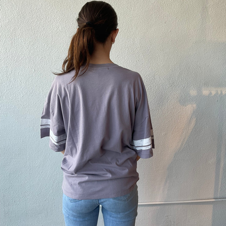DAYDREAMER Queen Varsity Hazy Violet Tee
